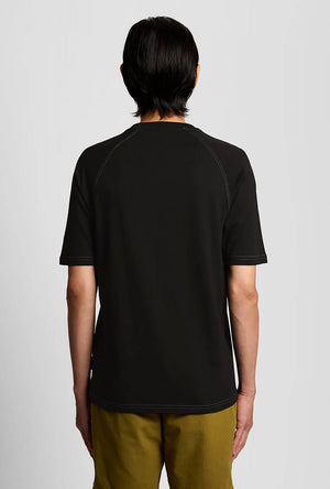 Back image of a model wearing the Keep fresh graphic t in navy, by brand Lyle and scott