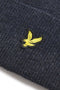 Logo detail image of the Lyle and scott lambswool ribbed beanie in navy, by brand Lyle and scott