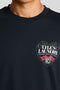 Front image of a model wearing the Lyles laundry graphic t in navy, by brand Lyle and scott