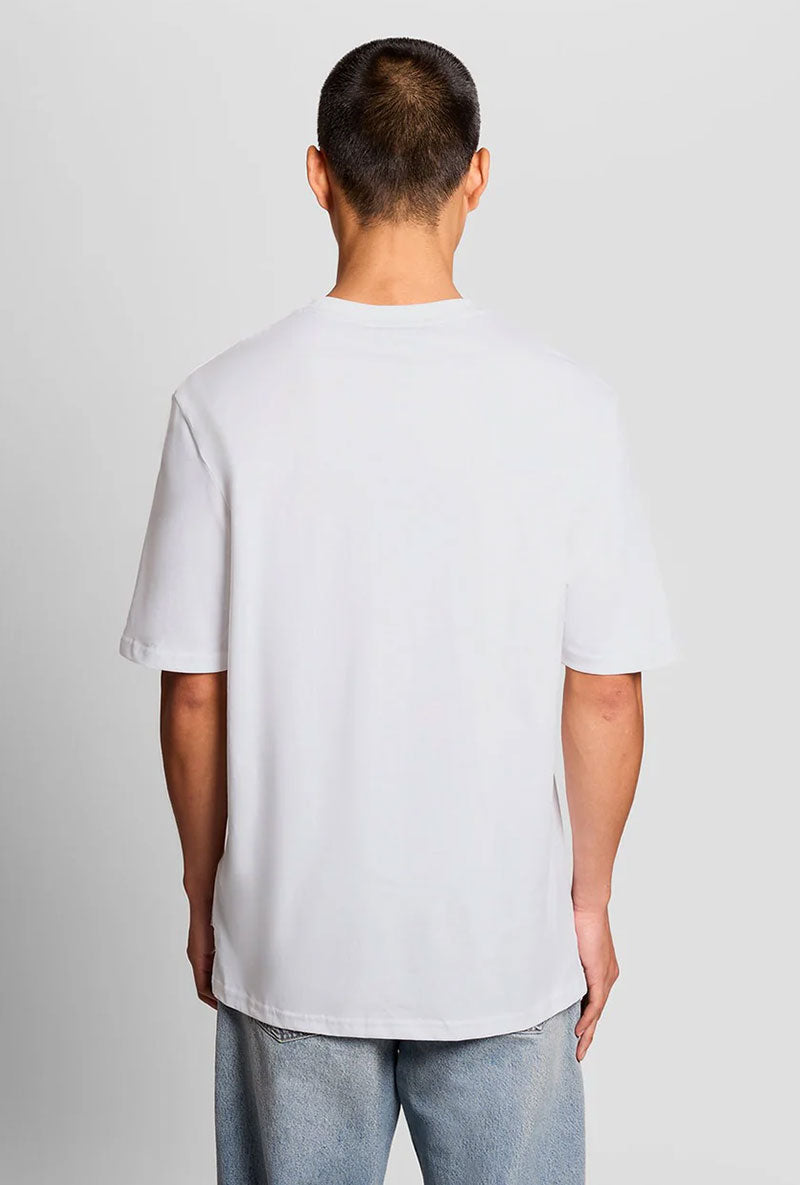 Back image of a model wearing Lyles laundry graphic t in white, by brand Lyle and scott
