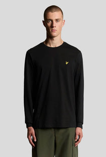 Front image of a model wearing the Plain ls tshirt in black, by brand Lyle and scott