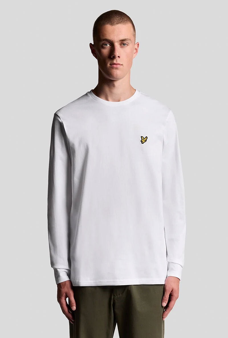 Front image of a model wearing Plain ls tshirt in white, by brand Lyle and scott