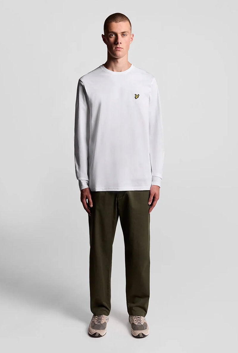 Front image of a model wearing Plain ls tshirt in white, by brand Lyle and scott