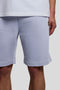 Front detail image of a model wearing the Sweat shorts in blue, by brand Lyle and scott