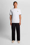 Front image of a model wearing the Fine tipped t in white, by brand Lyle and scott