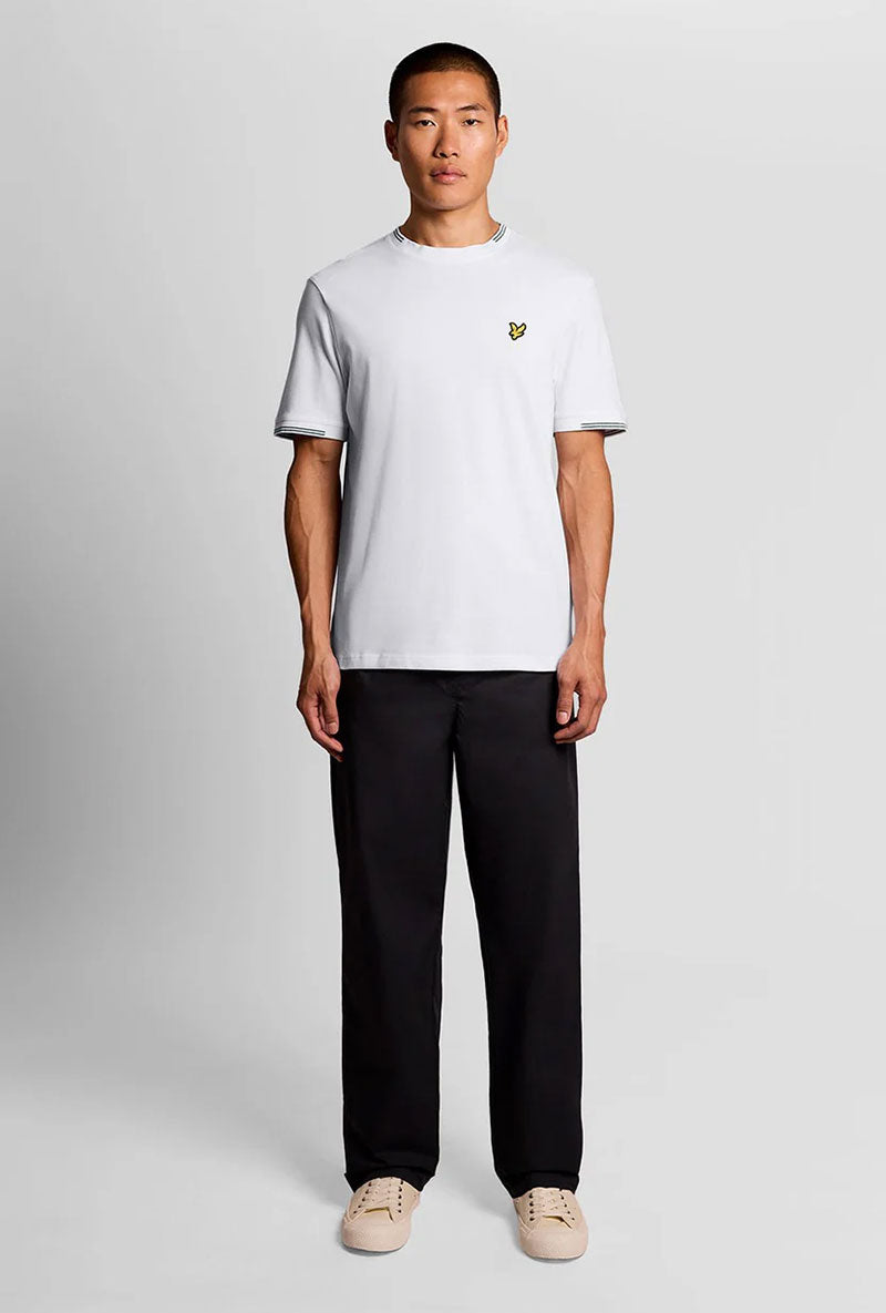 Front image of a model wearing Fine tipped t in white, by brand Lyle and scott
