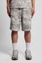 Front image of a model wearing Industrial print sweat shorts in grey, by brand Lyle and scott