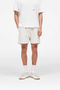 Front image of the Micro owners club mesh shorts in cream, by brand Represent