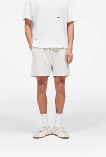 Front image of the Micro owners club mesh shorts in cream, by brand Represent