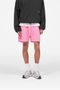 Front image of the Micro owners club mesh shorts in pink, by brand Represent