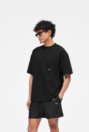 Front image of the Micro owners club tshirt in black, by brand Represent
