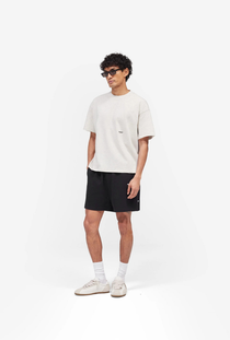 Front image of the Micro owners club tshirt in cream, by brand Represent