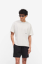 Front image of the Micro owners club tshirt in cream, by brand Represent