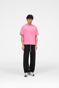 Front image of the Micro owners club tshirt in pink, by brand Represent