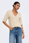 Front image of a model wearing Bouble ss vneck button cardigan in stone, by brand Only