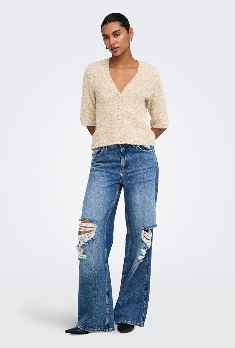 Front image of a model wearing Bouble ss vneck button cardigan in stone, by brand Only