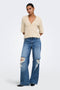 Front image of a model wearing the Bouble ss vneck button cardigan in stone, by brand Only