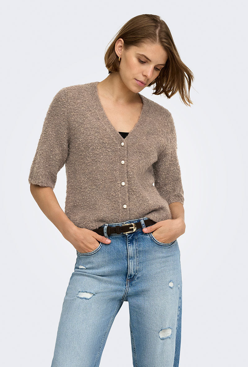 Front image of a model wearing Bouble ss vneck button cardigan in brown, by brand Only