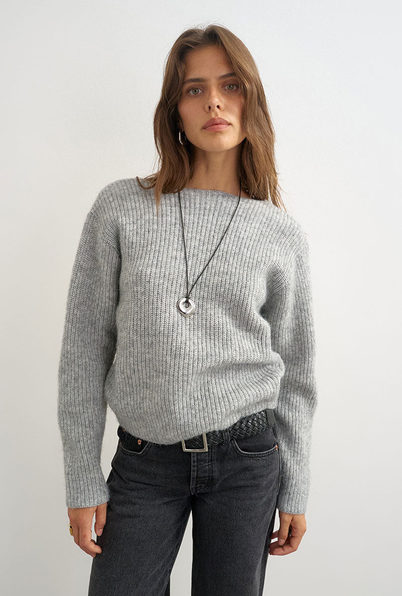 Front image of a model wearing Cally knitted knot jumper in grey, by brand Top shop