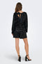 Back image of a model wearing the Confidence ls sequin bow top in black, by brand Only
