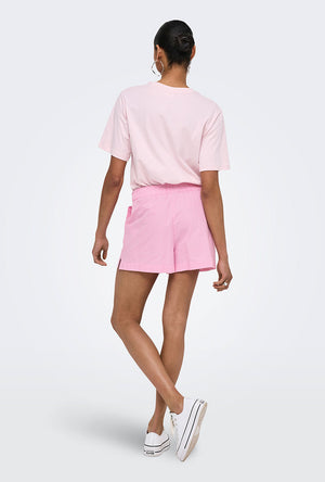 Back image of a model wearing the Filucca hw pull up shorts in pink, by brand Only