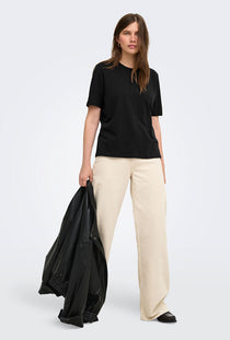 Front image of a model wearing the Happy ss oneck tee in black, by brand Only