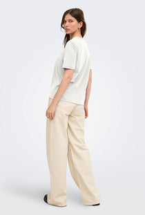 Back image of a model wearing the Happy ss oneck tee in off white, by brand Only