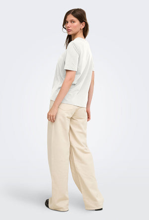 Back image of a model wearing the Happy ss oneck tee in off white, by brand Only