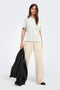 Front image of a model wearing Happy ss oneck tee in off white, by brand Only