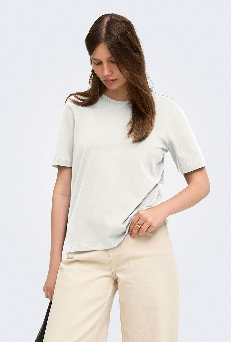 Front image of a model wearing Happy ss oneck tee in off white, by brand Only