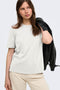 Front image of a model wearing the Happy ss oneck tee in off white, by brand Only