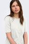 Front image of a model wearing the Happy ss oneck tee in off white, by brand Only