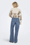 Back image of a model wearing the Hope mw wide jeans in denim, by brand Only