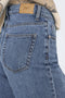 Back pocket detail image of a model wearing the Hope mw wide jeans in denim, by brand Only