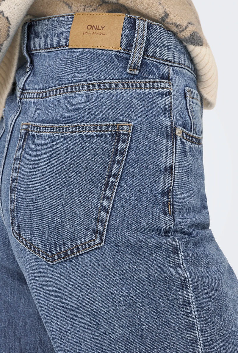 Back pocket detail image of a model wearing Hope mw wide jeans in denim, by brand Only