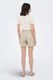 Back image of a model wearing the Jdy say hw linen string shorts in oat, by brand Jacqueline de yong