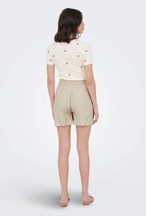 Back image of a model wearing the Jdy say hw linen string shorts in oat, by brand Jacqueline de yong