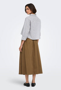 Back image of a model wearing the Laven zora hw long belt skirt in brown, by brand Only