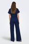 Back image of a model wearing the Leoni seersucker cap knot shirt in navy, by brand Only
