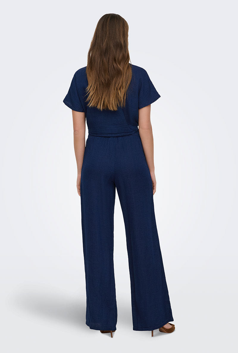 Back image of a model wearing Leoni seersucker cap knot shirt in navy, by brand Only