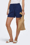 Front image of a model wearing Leoni seersucker pull up shorts in navy, by brand Only