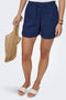 Front image of a model wearing the Leoni seersucker pull up shorts in navy, by brand Only