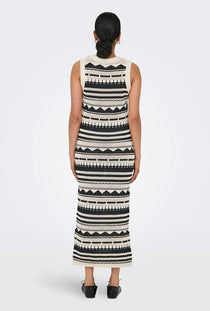 Back image of a model wearing the Only merida life maxi knit dress in ecru, by brand Only