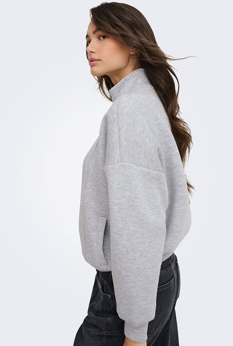 Front image of a model wearing Nadja ls zip sweat in grey, by brand Only