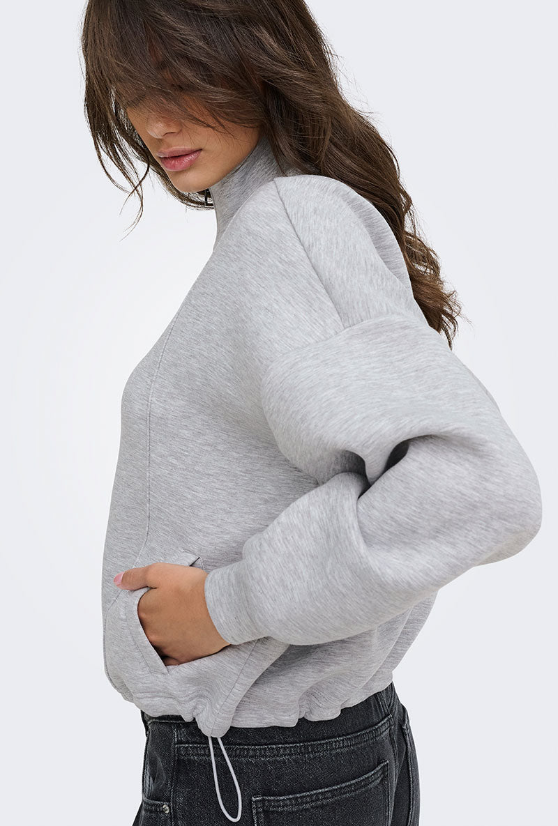 Front image of a model wearing Nadja ls zip sweat in grey, by brand Only