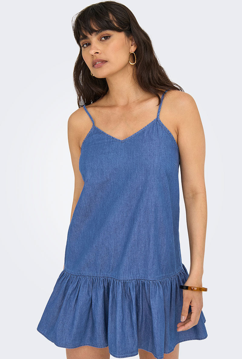 Front image of a model wearing Only nova azure dress in denim, by brand Only