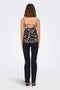 Back image of a model wearing the Nova life viscose paris singlet in black/white, by brand Only