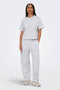 Front image of a model wearing the Ofelia sweatpants in light grey, by brand Only