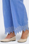 Front detail image of a model wearing the Only paula tulum emb trousers in blue, by brand Only