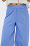Front detail image of a model wearing the Only paula tulum emb trousers in blue, by brand Only